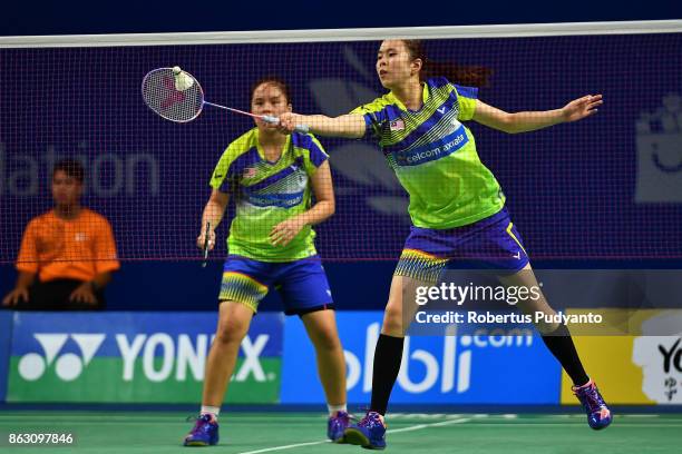 Tan Pearly Koong Le and Toh Ee Wei of Malaysia compete against Yuting Xia and Zhang Shuxian of China during Women's Doubles Round 16 match of the BWF...