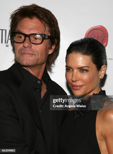 Harry Hamlin and Lisa Rinna arrive at the Los Angeles Confidential Magazine May/June issue launch party at XIV on April 30, 2009 in West Hollywood,...