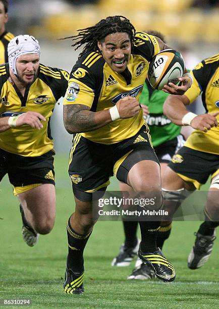 Ma'a Nonu of the Hurricanes runs with the ball during the round 12 Super 14 match between the Hurricanes and the Blues at Westpac Stadium on May 1,...