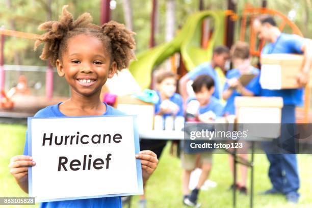 children's sports team charity drive for donations, local disaster relief. - disaster relief stock pictures, royalty-free photos & images