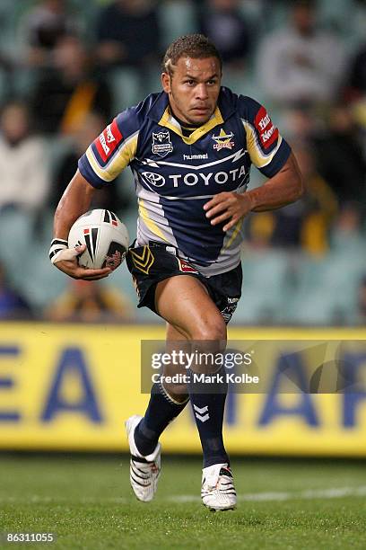 Matt Bowen of the Cowboys runs the ball back from a kick during the round eight NRL match between the Parramatta Eels and the North Queensland...