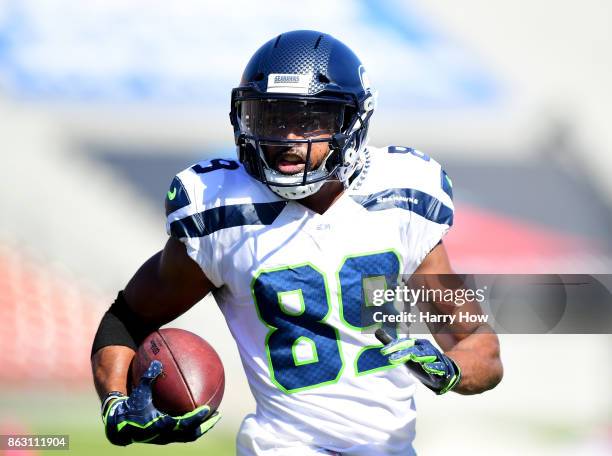 Doug Baldwin of the Seattle Seahawks runs after his catch against the Los Angeles Rams at Los Angeles Memorial Coliseum on October 8, 2017 in Los...