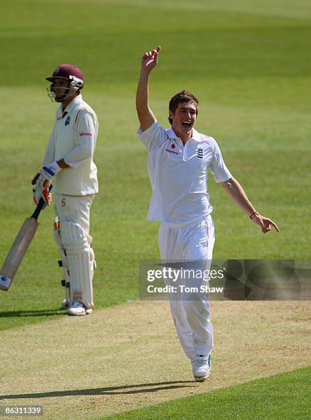 Chris Woakes of England celebrates taking his 5th wicket of Shivnarine Chanderpaul of the West Indies during day 2 of the tour match between England...