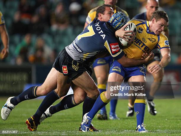 Matthew Keating of the Eels is tackled during the round eight NRL match between the Parramatta Eels and the North Queensland Cowboys at Parramatta...