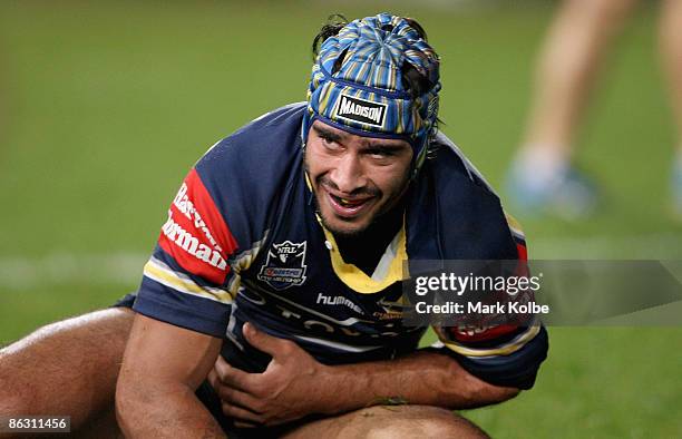 Johnathan Thurston of the Cowboys looks to the sideline nursing his shoulder during the round eight NRL match between the Parramatta Eels and the...