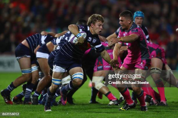 Leo Ghirard of Agen is challenged by Jake Polledri of Gloucester during the European Rugby Challenge Cup Pool 3 match between Gloucester and Agen at...