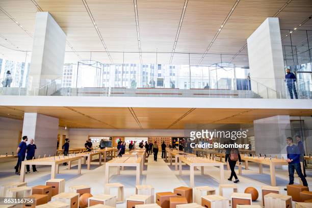 Products sit on display during a media preview of the new Apple Inc. Michigan Avenue store in Chicago, Illinois, U.S., on Thursday, Oct. 19, 2017....