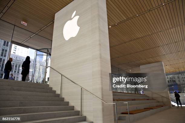 Signage is seen during a media preview of the new Apple Inc. Michigan Avenue store in Chicago, Illinois, U.S., on Thursday, Oct. 19, 2017. The...