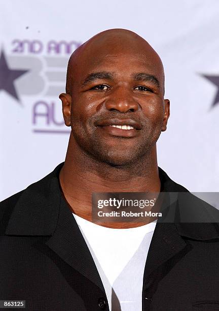 Boxer Evander Holyfield poses backstage during the 2nd Annual BET Awards on June 25, 2002 at the Kodak Theater in Hollywood, California.