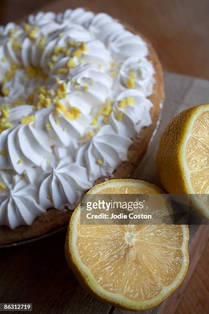 fresh lemons and cream pie - custard pie fight stock pictures, royalty-free photos & images