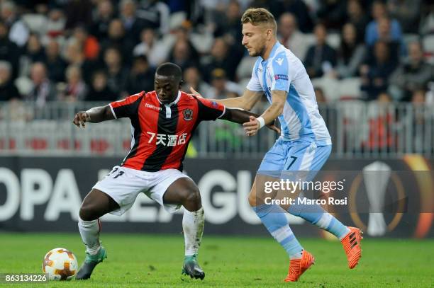 Ciro Immobile of SS Lazio compete for the ball with Mendy of OGC Nice during the UEFA Europa League group K match between OGC Nice and Lazio at...