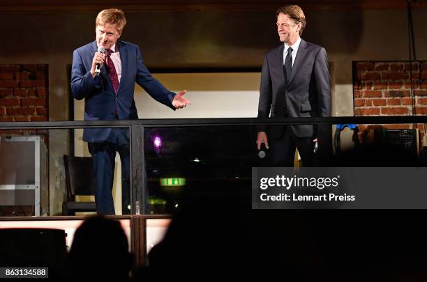 Presenter Rudi Cerne and producer Martin Gross speak during the 'Aktenzeichen XY... Ungeloest' 50th anniversary celebration at Park Cafe on October...