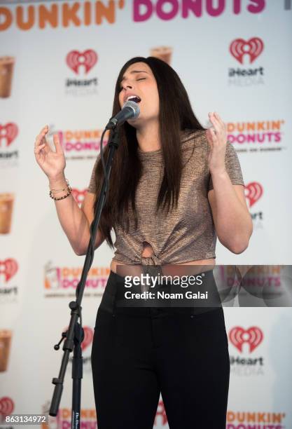 Singer Marina Morgan performs at the Dunkin' Donuts Iced Coffee Lounge on October 19, 2017 in New York City.