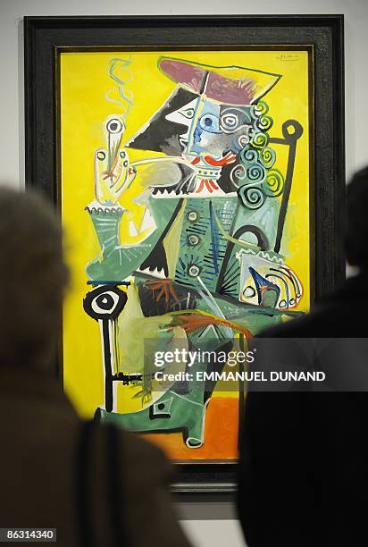 "Mousquetaire a la pipe" by artist Pablo Picasso is on displays at Christie's during a press preview of their Impressionist and Modern Art Evening...