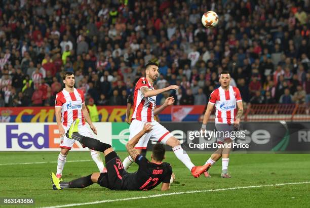 Olivier Giroud scores a goal for Arsenal during the UEFA Europa League group H match between Crvena Zvezda and Arsenal FC at Rajko Mitic Stadium on...