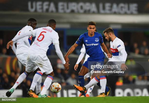 Dominic Calvert-Lewin of Everton takes on Mouctar Diakhaby, Marcelo and Lucas Tousart of Lyon during the UEFA Europa League Group E match between...