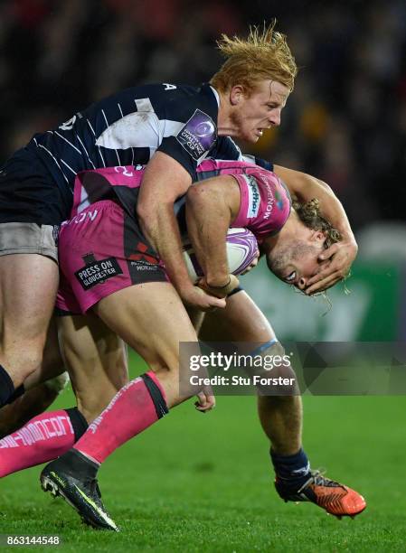 Agen win Branden Holder gets to grips with Henry Purdy of Gloucester during the European Rugby Challenge Cup match between Gloucester Rugby and Agen...