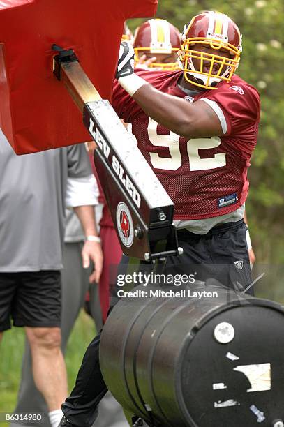 Albert Haynesworth of the Washington Redskins runs through drills during minicamp on May 1, 2009 at Redskins Park in Ashurn, Virginia.