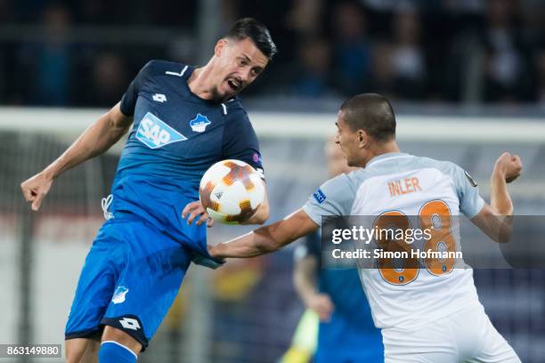 Sandro Wagner of Hoffenheim jumps for a header with Goekhan Inler of Istanbul during the UEFA Europa League group C match between 1899 Hoffenheim and...