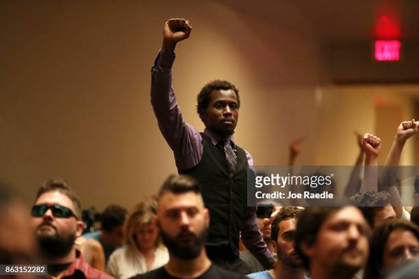 People react as white nationalist Richard Spencer, who popularized the term "alt-right" speaks at the Curtis M. Phillips Center for the Performing...