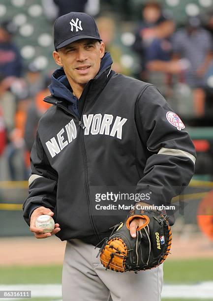 Joe Girardi of the New York Yankees plays catch before the game against the Detroit Tigers at Comerica Park on April 29, 2009 in Detroit, Michigan....