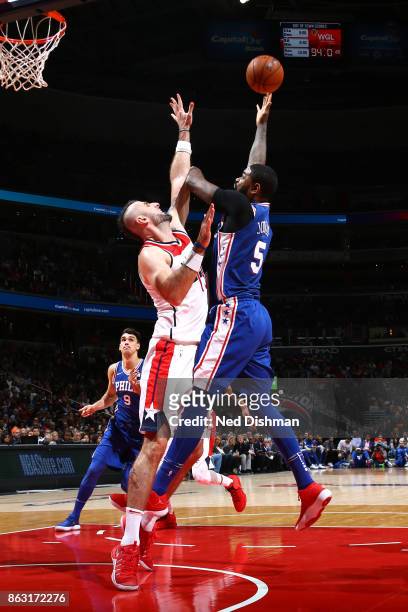 Amir Johnson of the Philadelphia 76ers drives to the basket against the Washington Wizards on October 18, 2017 at Capital One Arena in Washington,...