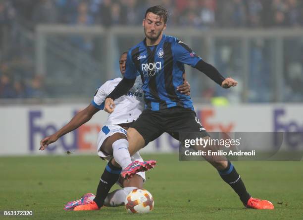 Bryan Cristante of Atalanta BC competes for the ball with Alef dos Santos Saldanha of Apollon Limassol FC during the UEFA Europa League group E match...