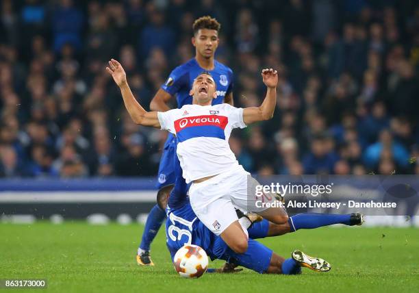 Ademola Lookman of Everton FC fouls Marcal of Olympique Lyon during the UEFA Europa League group E match between Everton FC and Olympique Lyon at...