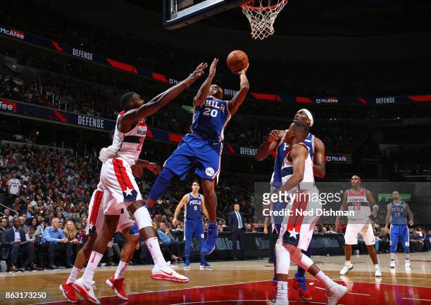 Markelle Fultz of the Philadelphia 76ers drives to the basket against the Washington Wizards on October 18, 2017 at Capital One Arena in Washington,...