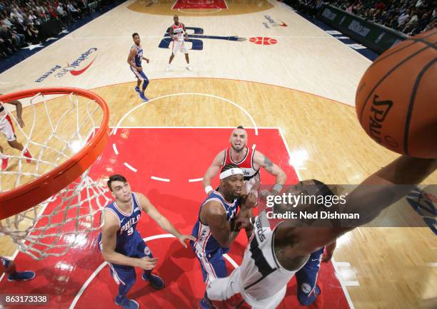 John Wall of the Washington Wizards dunks the ball against the Philadelphia 76ers on October 18, 2017 at Capital One Arena in Washington, DC. NOTE TO...