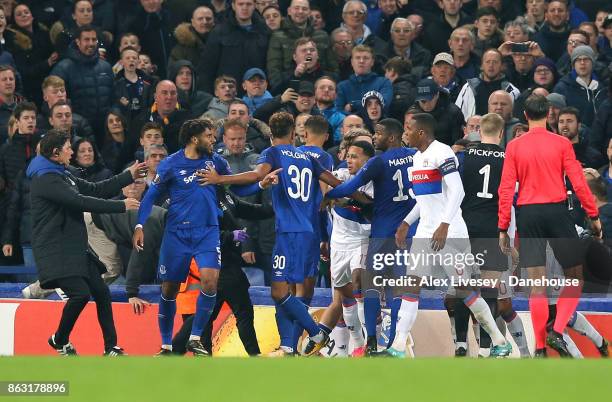 Ashley Williams of Everton FC clashes with Marcelo of Olympique Lyon during the UEFA Europa League group E match between Everton FC and Olympique...