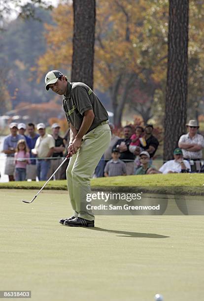 Sergio Garcia putting on the 11th green with his wedge due to his broken putter during the third round of THE TOUR Championship at East Lake Golf...