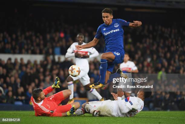 Dominic Calvert-Lewin of Everton is foiled by Anthony Lopes and Kenny Tete of Lyon during the UEFA Europa League Group E match between Everton FC and...