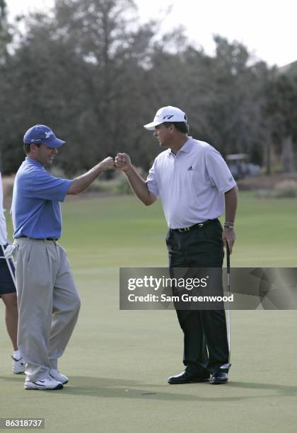 John Huston and Kenny Perry birdie the 13th hole during the final round of the Franklin Templeton Shark Shootout held on the Tiburon course at the...