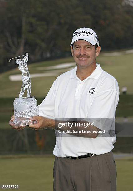 Bart Bryant holding his championship trophy after winning THE TOUR Championship at East Lake Golf Club in Atlanta, Georgia on November 6, 2005.