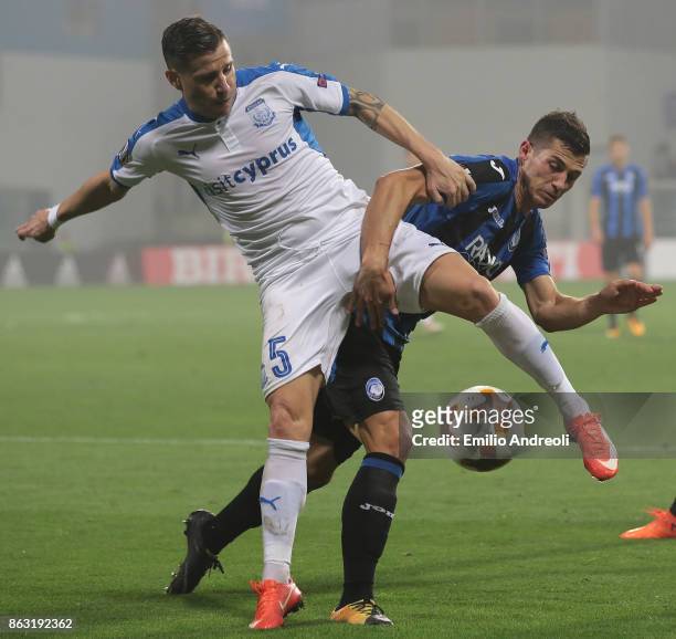 Esteban Sachetti of Apollon Limassol FC competes for the ball with Remo Freuler of Atalanta BC during the UEFA Europa League group E match between...