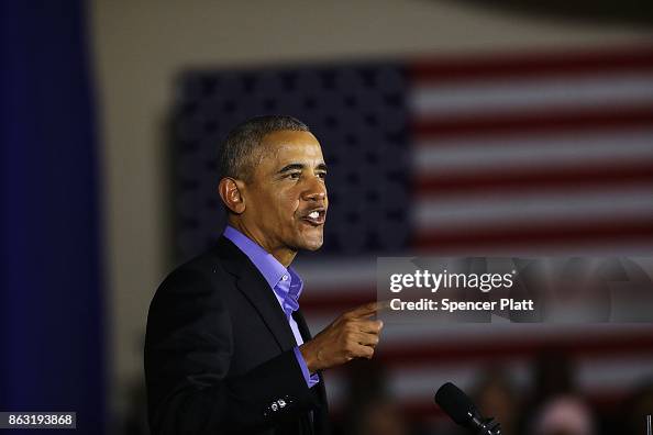 Former U.S. President Barack Obama speaks at a rally in support of ...