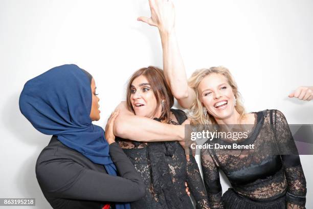 Halima Aden, Carine Roitfeld and Eva Herzigova attend The Veuve Clicquot Widow Series By Carine Roitfeld And CR Studio on October 19, 2017 in London,...