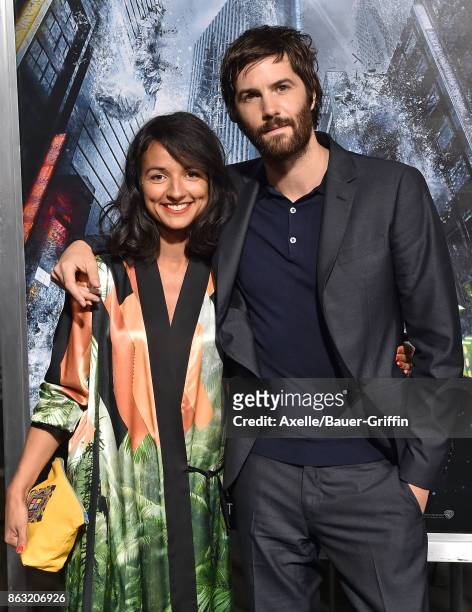 Actors Jim Sturgess and Dina Mousawi arrive at the premiere of 'Geostorm' at TCL Chinese Theatre on October 16, 2017 in Hollywood, California.
