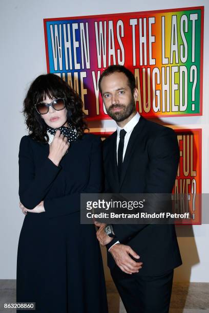 Isabelle Adjani and Benjamin Millepied attend the Art Exhibition Reflexion Redux of Benjamin Millepied and Barbara Kruger at Studio des Acacias on...