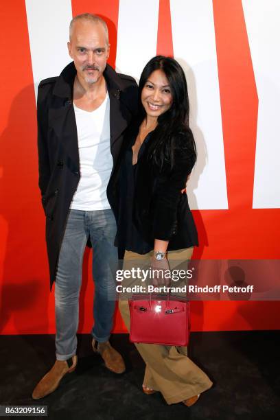 Christian Kretschmar and singer Anggun attend the Art Exhibition Reflexion Redux of Benjamin Millepied and Barbara Kruger at Studio des Acacias on...