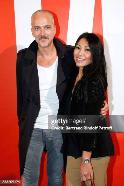 Christian Kretschmar and singer Anggun attend the Art Exhibition Reflexion Redux of Benjamin Millepied and Barbara Kruger at Studio des Acacias on...