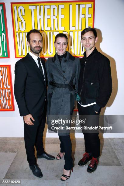 Benjamin Millepied, Marie-Agnes Gillot and dancer Marc Moreau attend the Art Exhibition Reflexion Redux of Benjamin Millepied and Barbara Kruger at...