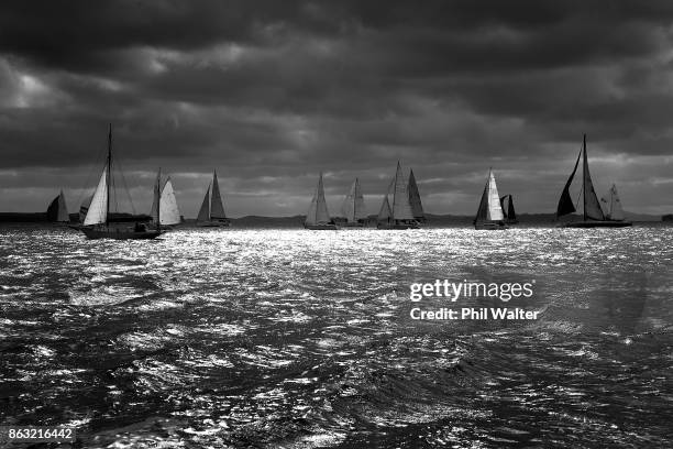 The fleet leaves Auckland Harbour and through the Rangitoto channel at the Start of the Coastal Classic yacht race on October 20, 2017 in Auckland,...