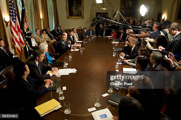 President Barack Obama speaks to his cabinet as Secretary of Defense Robert Gates, Energy Secretary Steven Chu , Commerce Secretary Gary Locke,...