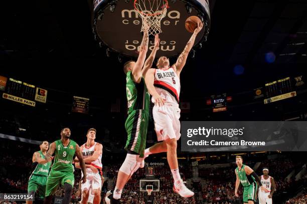 Pat Connaughton of the Portland Trail Blazers shoots the ball during the preseason game against the Maccabi Haifa on October 13, 2017 at the Moda...