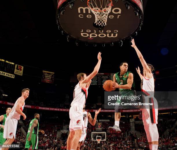 Angel Rodriguez of the Maccabi Haifa handles the ball during the preseason game against the Portland Trail Blazers on October 13, 2017 at the Moda...