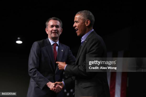 Former U.S. President Barack Obama greets Democratic gubernatorial candidate and Virginia Lieutenant Governor Ralph Northam during a campaign event...
