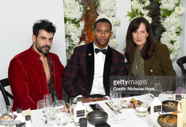 Designer Eli Halili, NFL player Victor Cruz and Barneys New York CEO Daniella Vitale attend A Night With Eli Halili on October 19, 2017 in New York...