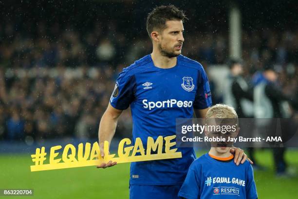 Kevin Mirallas of Everton holds a message which reads Equal Game during the UEFA Europa League group E match between Everton FC and Olympique Lyon at...